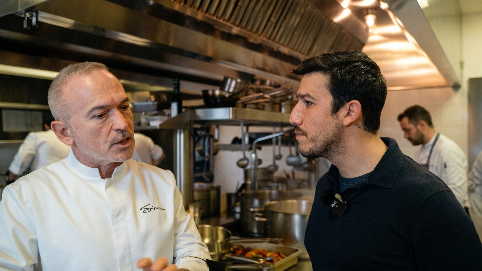 Daniel Ciommiento working with a chef in a luxury kitchen